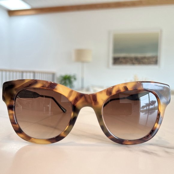 THIERRY LASRY Brown Tortoise Shell Leggy Sunglasses with Black Titanium Arms